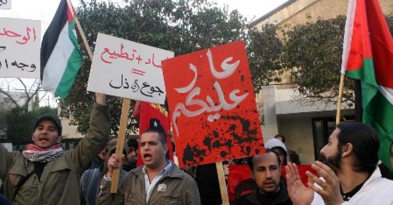 50 Jordanian youth stand in solidarity outside Egypt Embassy in Amman