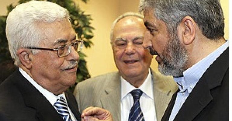 مصدر فلسطيني: عباس ومشعل التقيا "سرا" في عمان