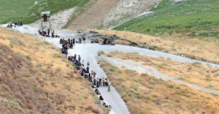 الظروف الجوية تعيق وصول اللاجئين السوريين 