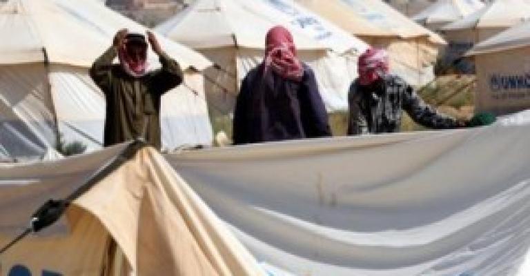 سوريون في الزعتري يحيون إعلان الجهاد