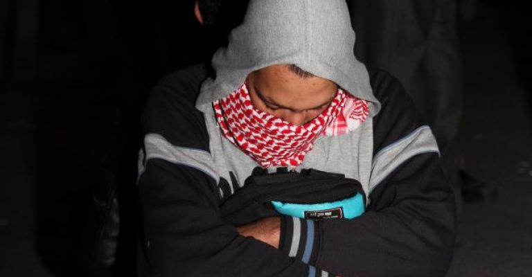 جهاد غبن "الرجل البخاخ"... من الألوان إلى حمل السلاح جهاد غبن "الرجل البخاخ"... من الألوان إلى حمل السلاح