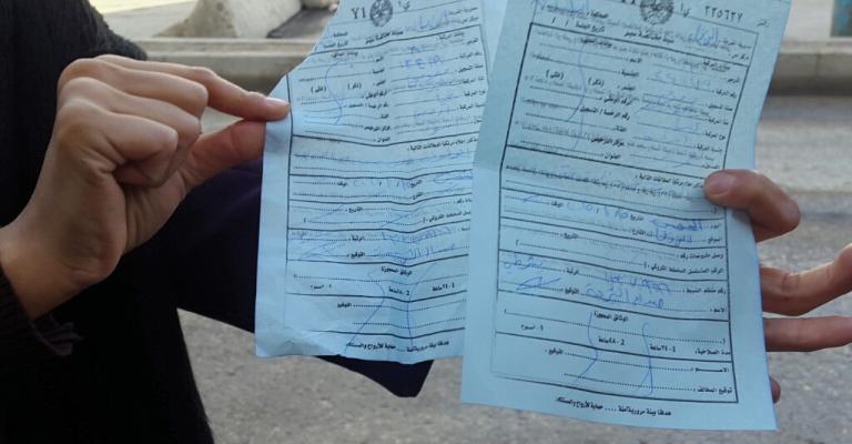 مخالفات بالجملة لسيارات الموظفين امام "الاحوال" مخالفات بالجملة لسيارات الموظفين امام "الاحوال"