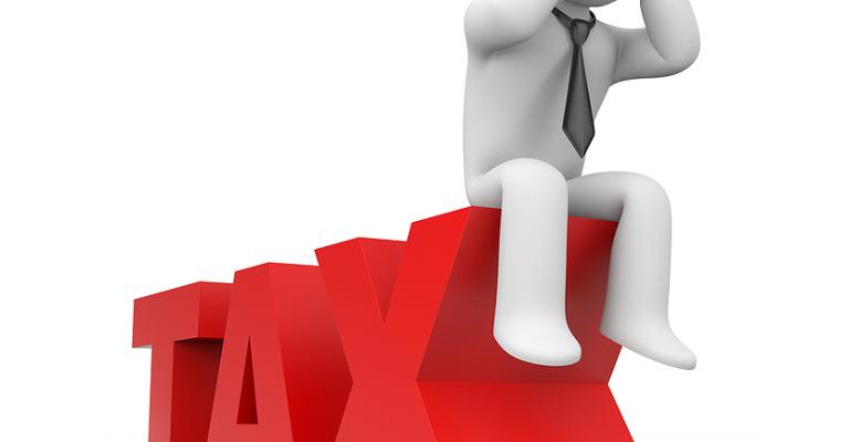 العدالة والطبقة الوسطى ضحيتا ضريبة الدخل