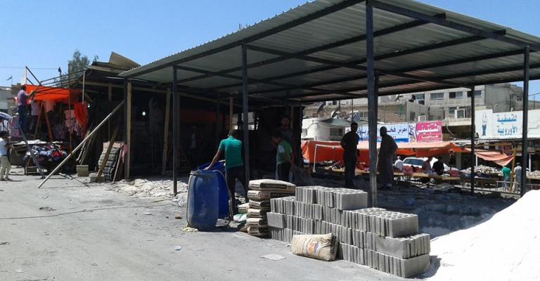 تجار بالة الزرقاء: الحريق "مدبر" لطردنا من السوق