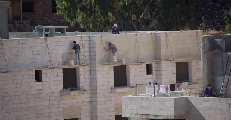 عمّال بناء في عمّان بعدسة غسان فرج