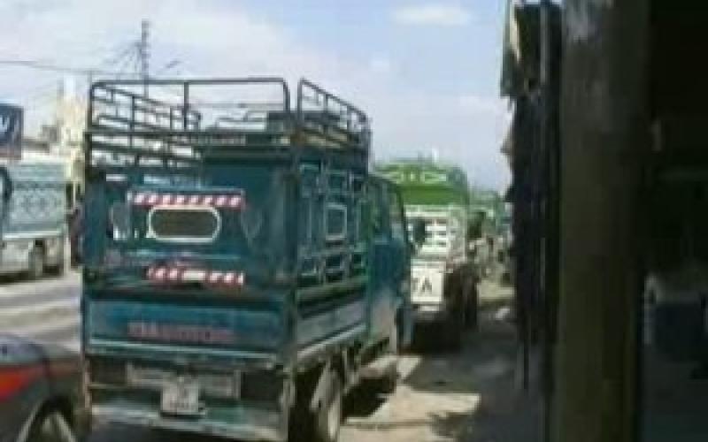  بالفيديو معاناة تجار سوق الكرامة بسبب اصطفاف السيارات 