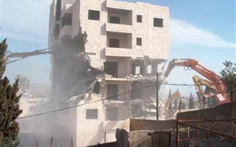 هدم 11 عمارة سكنية في ضاحية الامير حسن (فيديو)