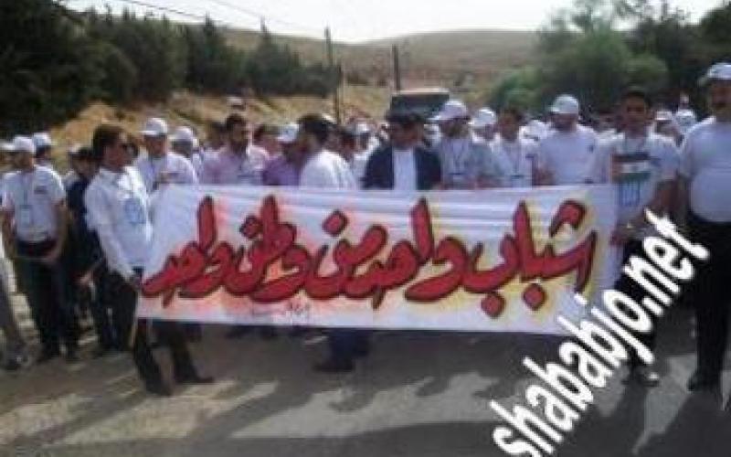 Passport of participant in anti-Sykes–Picot agreement march hold