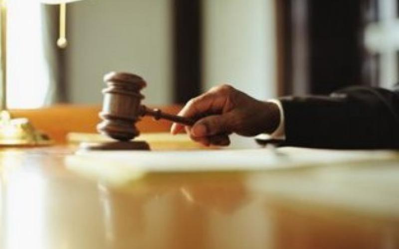 Father convicted for murdering son over barn wall