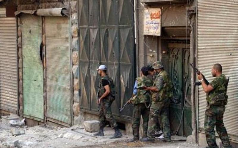 سوريا تحذر الفصائل وتقتحم مكاتب مشعل وأبو مرزوق