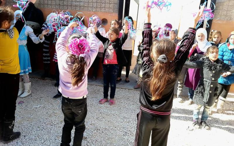جانب من فعاليات الاحتفال باليوم العالمي للطفل في مخيم الزعتري/ تصوير فراس اللباد