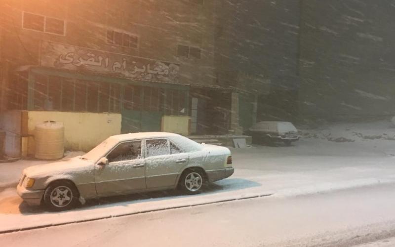 الثلوج تغطي مناطق في الطفيلة